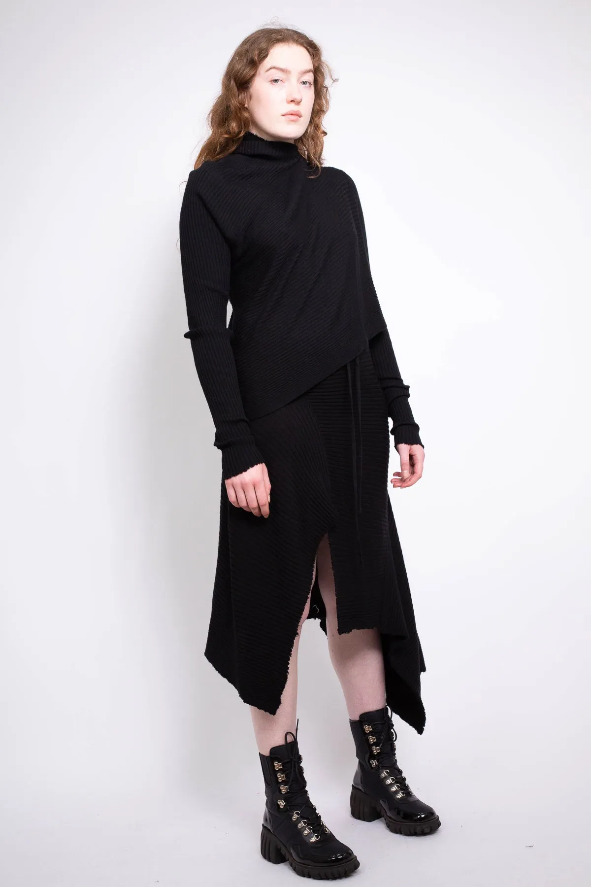 CLASSIC M'A DRAPED MERINO SKIRT IN BLACK